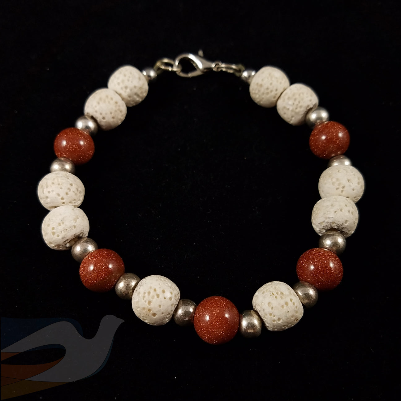 Goldstone and lava bead bracelet