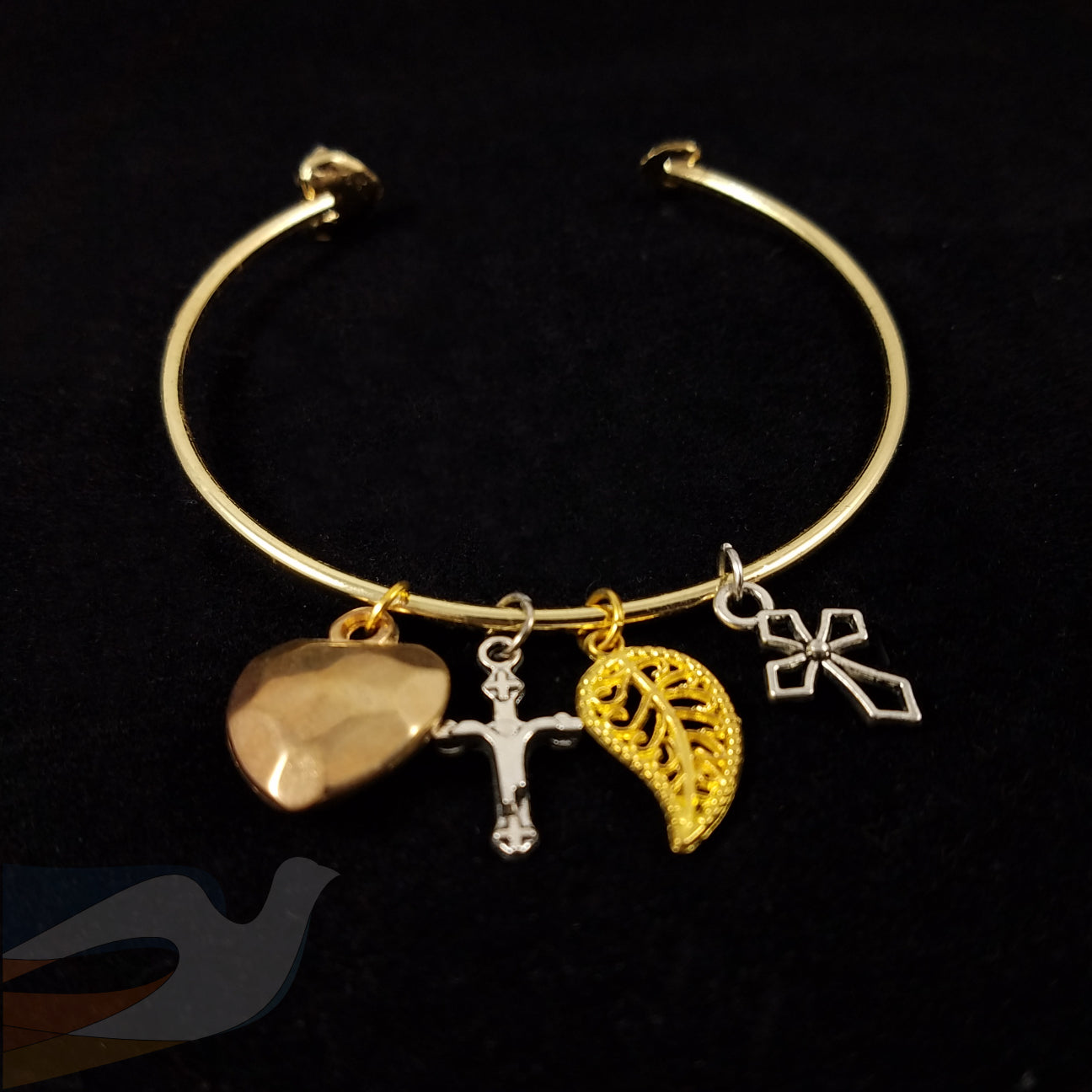 Mixed metal charm bracelet