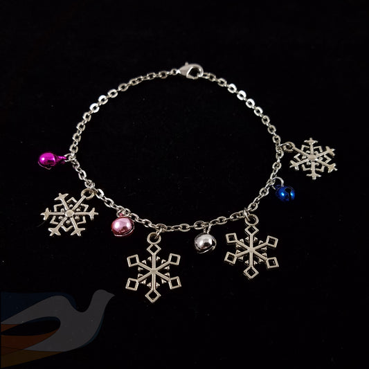 Snowflake and bell charm bracelet