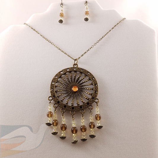 Antiqued Gold and crystal pendant Necklace/Earring set
